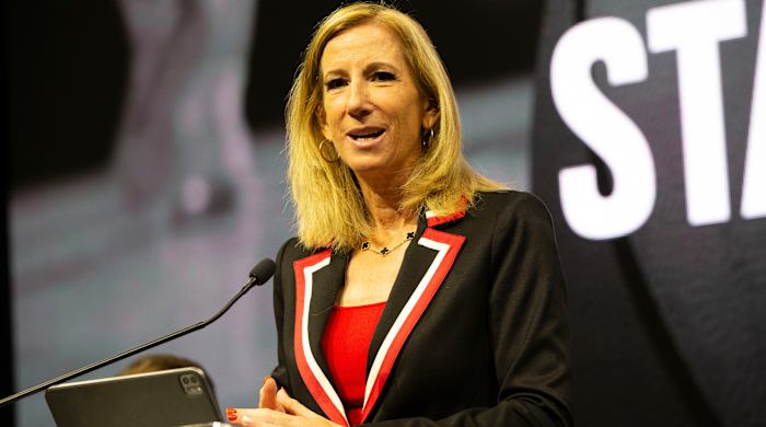 WNBA commissioner Cathy Engelbert makes opening remarks at a podium while announcing a WNBA expansion franchise in the San Francisco Bay Area.